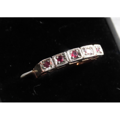 116 - Five Stone Ruby Ring Mounted on 9 Carat Yellow Gold with Silver Setting Ring Size O