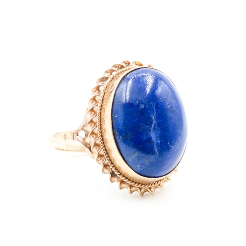 130 - Single Stone Lapis Lazuli Set Ring Mounted in 9 Carat Yellow Gold Ring Size M