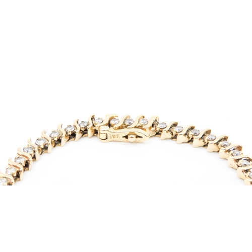 131 - Diamond Set Wave Design Tennis Bracelet Mounted in 18 Carat Yellow Gold 20cm Long Approximately 4 Ca... 