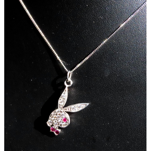 150 - Ruby and Gem Playboy Logo Pendant 3cm Drop Mounted on 9 Carat White Gold Chain 45cm Long