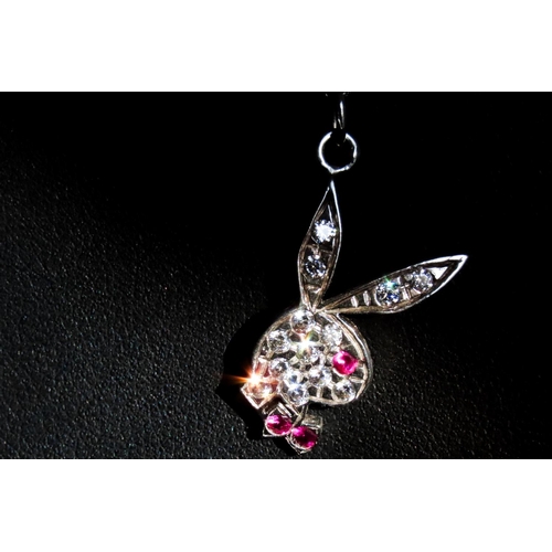 150 - Ruby and Gem Playboy Logo Pendant 3cm Drop Mounted on 9 Carat White Gold Chain 45cm Long