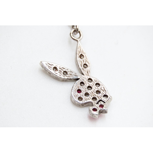 150 - Ruby and Gem Playboy Logo Pendant 3cm Drop Mounted on 9 Carat White Gold Chain 45cm Long