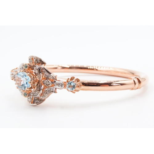 153 - 9 Carat Rose Gold Aquamarine Set Ladies Bangle Further Decorated with Diamonds Inner Width 6.5cm