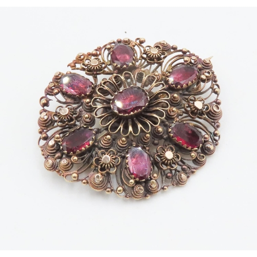 168 - Victorian 9 Carat Yellow Gold Red Garnet Decorated Brooch 4cm Wide Oval Form