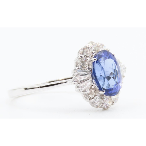 175 - 2.20 Carat Tanzanite Centerstone Ring with Tapered Baguette and Round Cut Diamond Surround Set in 18... 