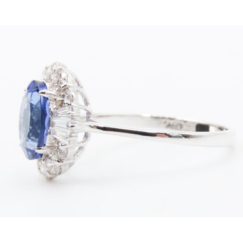 175 - 2.20 Carat Tanzanite Centerstone Ring with Tapered Baguette and Round Cut Diamond Surround Set in 18... 