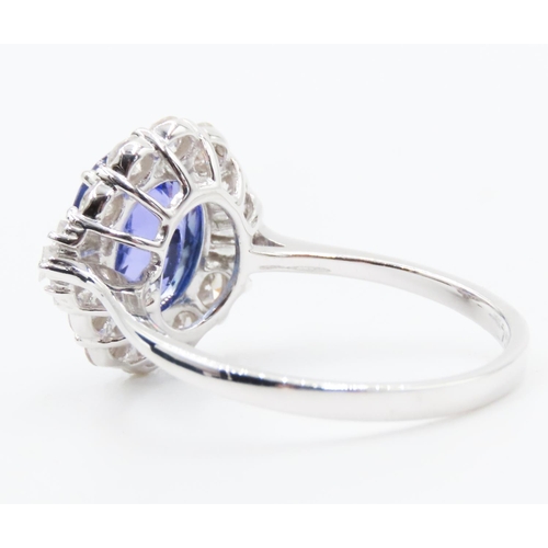 175 - 2.20 Carat Tanzanite Centerstone Ring with Tapered Baguette and Round Cut Diamond Surround Set in 18... 