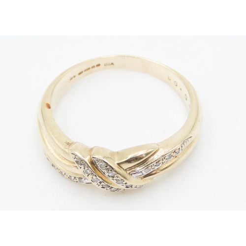 189 - Diamond Set Knot Motif Ring Mounted on 9 Carat Yellow Gold Ring Size R