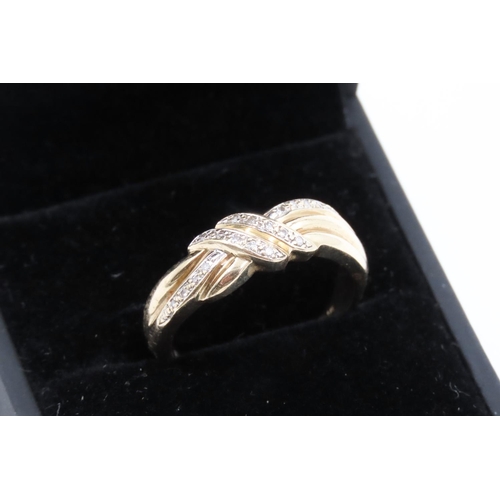 189 - Diamond Set Knot Motif Ring Mounted on 9 Carat Yellow Gold Ring Size R