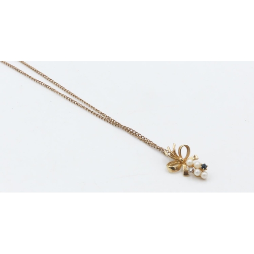 213 - Seed Pearl Sapphire and Diamond Set Bow Motif Pendant 1.5cm Drop Further Set on 9 Carat Yellow Gold ... 