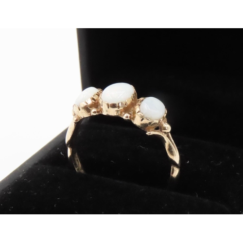 240 - Three Stone Opal Basket Set Ring Mounted in 9 Carat Yellow Gold Ring Size S and a Half