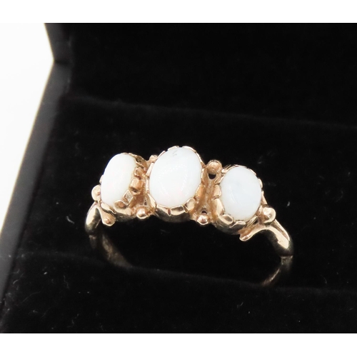 240 - Three Stone Opal Basket Set Ring Mounted in 9 Carat Yellow Gold Ring Size S and a Half