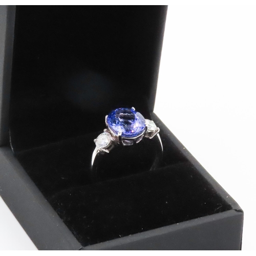 250 - Oval Cut AAA Tanzanite and Diamond Three Stone Ring Set in 18 Carat White Gold Total Tanzanite Carat... 