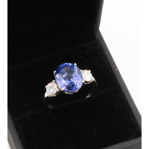 250 - Oval Cut AAA Tanzanite and Diamond Three Stone Ring Set in 18 Carat White Gold Total Tanzanite Carat... 