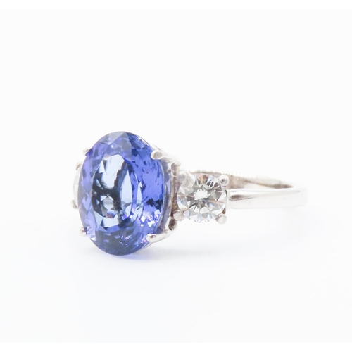 250 - Oval Cut AAA Tanzanite and Diamond Three Stone Ring Set in 18 Carat White Gold Total Tanzanite Carat... 