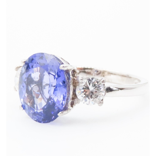 250 - Oval Cut AAA Tanzanite and Diamond Three Stone Ring Set in 18 Carat White Gold Total Tanzanite Carat... 