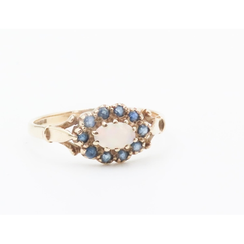 251 - Attractively Detailed Opal and Sapphire Set Ladies Cluster Ring Mounted in 9 Carat Yellow Gold Ring ... 