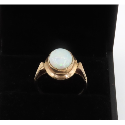 252 - Bezel Set Opal Single Stone Ring Set in 9 Carat Yellow Gold Ring Size N and a Half