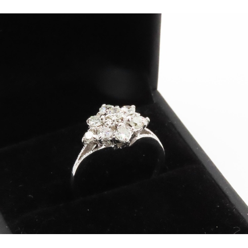 258 - 1950's Nine Stone Diamond Set Daisy Motif Ring Mounted in 18 Carat White Gold Total Diamond Carat We... 