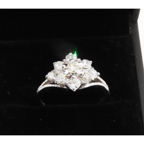 258 - 1950's Nine Stone Diamond Set Daisy Motif Ring Mounted in 18 Carat White Gold Total Diamond Carat We... 