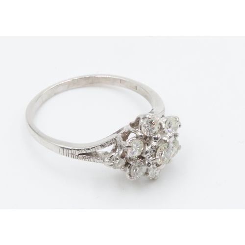 258 - 1950's Nine Stone Diamond Set Daisy Motif Ring Mounted in 18 Carat White Gold Total Diamond Carat We... 