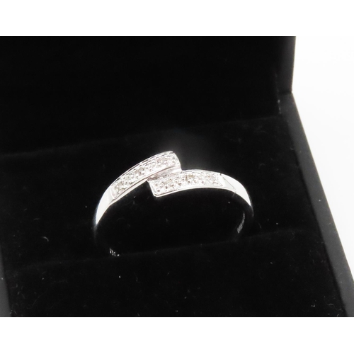 259 - Diamond Set Wrap Around Form Ring  Mounted in 9 Carat White Gold Ring Size P and a Half