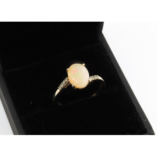 262 - Opal Ring Mounted in 9 Carat Yellow Gold with Aquamarines set to Band Opal of Attractive Colour Ring... 