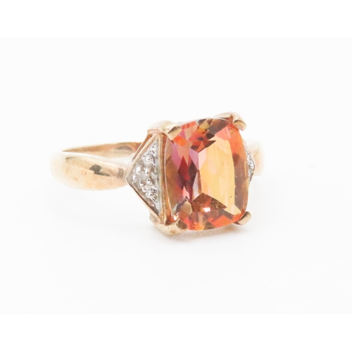 264 - Cushion Cut Colour Change Garnet Mounted in 9 Carat Yellow Gold with Further Diamonds Set to Shoulde... 