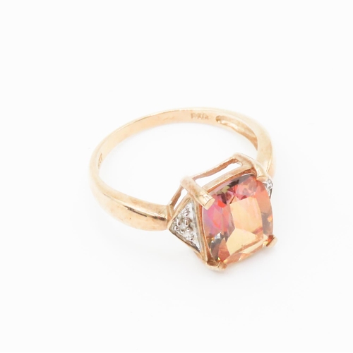 264 - Cushion Cut Colour Change Garnet Mounted in 9 Carat Yellow Gold with Further Diamonds Set to Shoulde... 