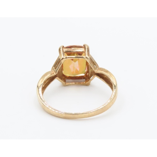 264 - Cushion Cut Colour Change Garnet Mounted in 9 Carat Yellow Gold with Further Diamonds Set to Shoulde... 