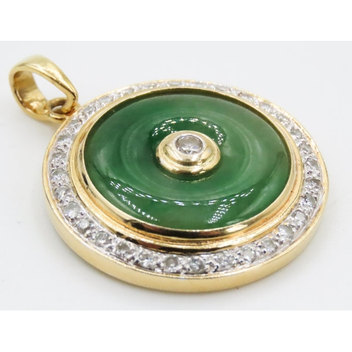 274 - Unusual Circular Form Jade Pendant Set in 18 Carat Yellow Gold with Diamond Surround Total Diamond C... 