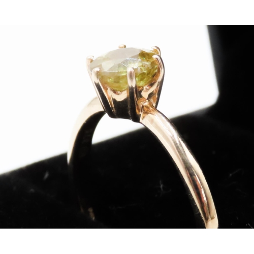 286 - Peridot Solitaire Ring Six Claw Set in 9 Carat Yellow Gold Ring Size L and a half