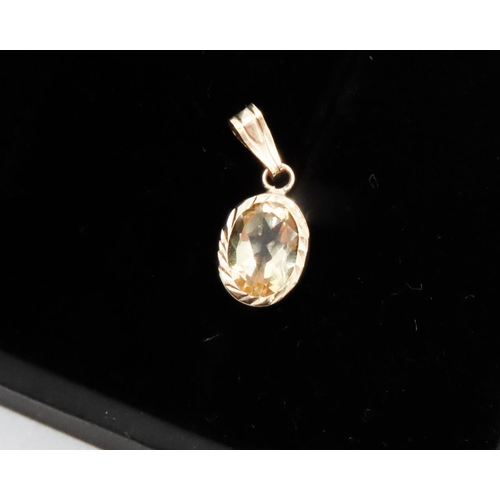 287 - Oval Cut Bezel Set Citrine Pendant Mounted in 9 Carat Yellow Gold 1.5cm High