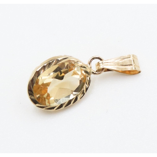 287 - Oval Cut Bezel Set Citrine Pendant Mounted in 9 Carat Yellow Gold 1.5cm High