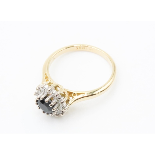 291 - Sapphire and Diamond Set Ladies Cluster Ring Mounted in 18 Carat Yellow Gold Ring Size N