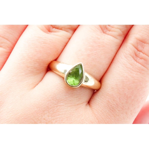 3 - Pear Cut Peridot Bezel Set in 9 Carat Yellow Gold Ring Size S