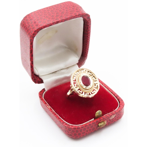 319 - Oval Cut Ruby Single Stone Geometric Design Set Ring Mounted in 14 Carat Yellow Gold Ring Size Q and... 