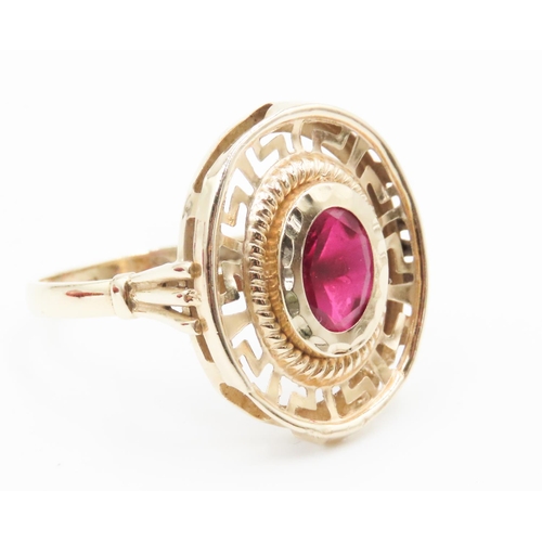 319 - Oval Cut Ruby Single Stone Geometric Design Set Ring Mounted in 14 Carat Yellow Gold Ring Size Q and... 