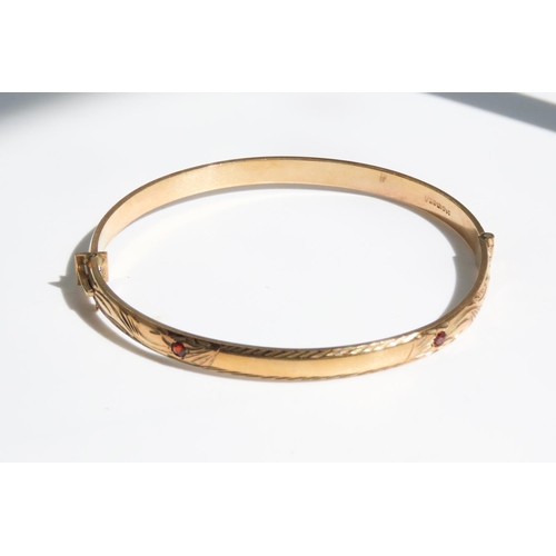 329 - 1 / 20th 9 Carat Yellow Gold Red Garnet Set Bangle 7cm Wide