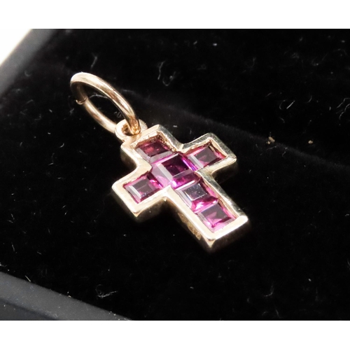 336 - Six Stone Ruby Set Cross Pendant Mounted in 9 Carat Yellow Gold 2cm High