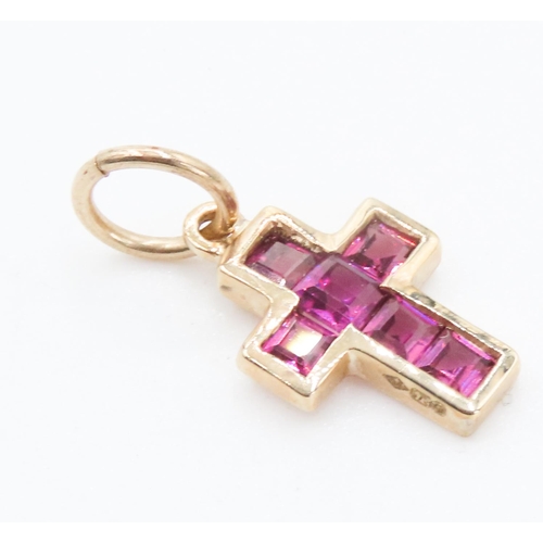 336 - Six Stone Ruby Set Cross Pendant Mounted in 9 Carat Yellow Gold 2cm High