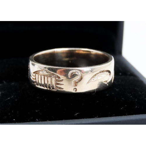 357 - Unusual 9 Carat Yellow Gold Band Ring with Various Incised Symbols Ring Size O