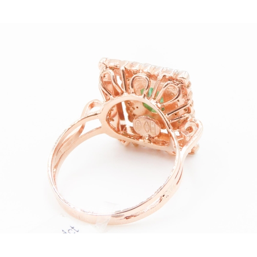 381 - Emerald Ring with Two Row Diamond Halo Set in 9 Carat Rose Gold Ring Size P