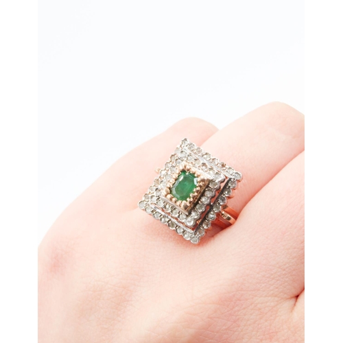 381 - Emerald Ring with Two Row Diamond Halo Set in 9 Carat Rose Gold Ring Size P