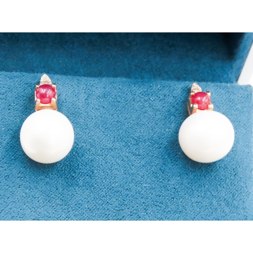 384 - Pair of Ruby and Diamond Set Pearl Earrings Mounted in 14 Carat Rose Gold Each 2cm high