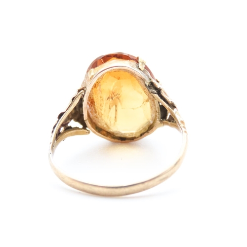 39 - Oval Facet Cut Cognac Citrine Single Stone Ring Mounted in 9 Carat Yellow Gold Ring Size N