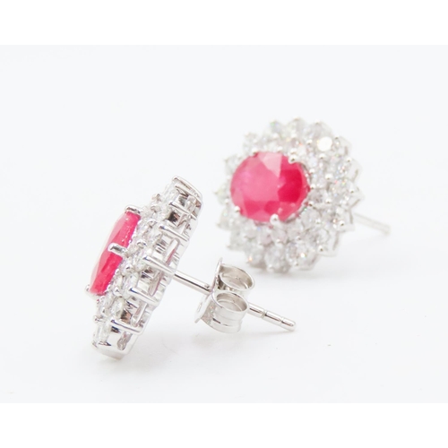 394 - Pair of Ruby Set Earrings with Double Diamond Halo Set in 18 Carat Rose Gold Each 1.5cm High