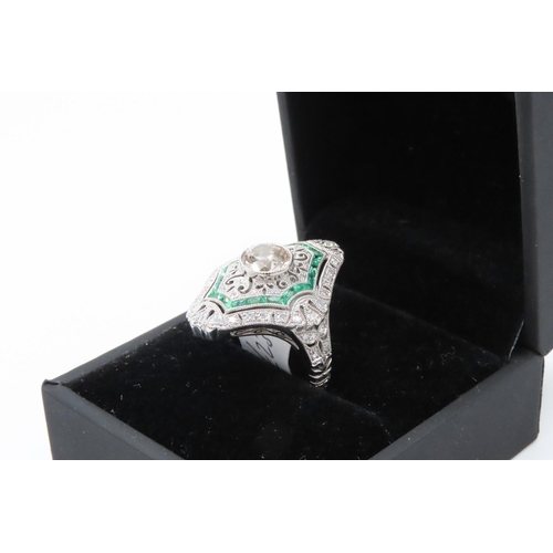 40 - Platinum Diamond Set Panel Ring with Inset Emeralds Lozenge Cut Finely Detailed Throughout  Centre D... 