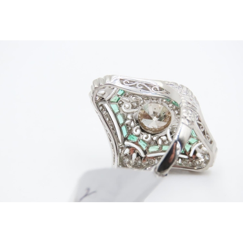 40 - Platinum Diamond Set Panel Ring with Inset Emeralds Lozenge Cut Finely Detailed Throughout  Centre D... 