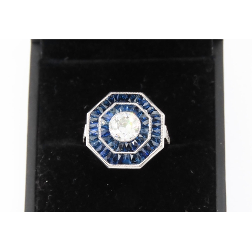 41 - Diamond and Sapphire Panel Set Ring Octagonal Form Centre Diamond 0.96 Carat Finely Incised Detailin... 